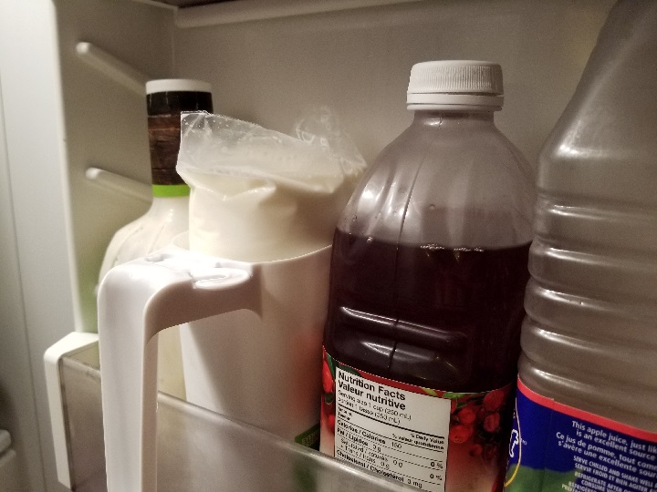 milk pitcher in the fridge door